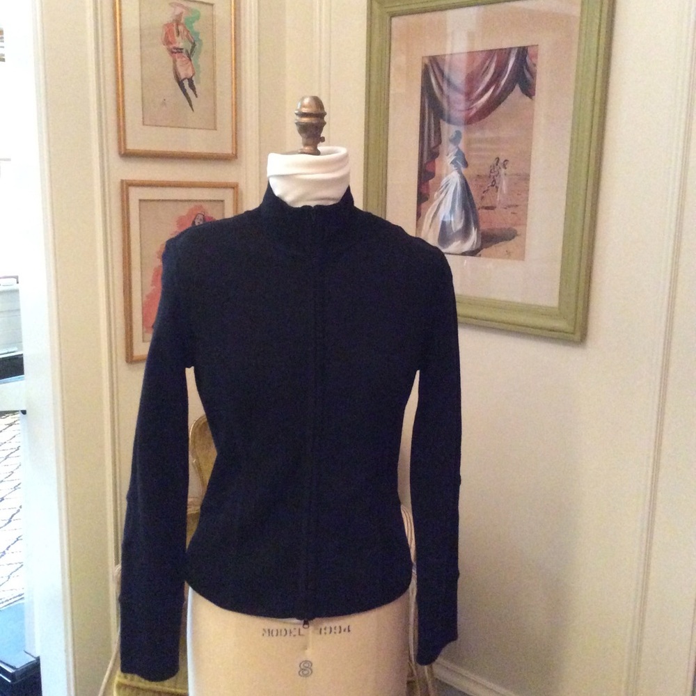 Black zip up jacket.